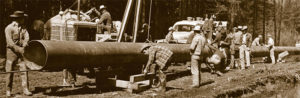 Trans Mountain construction men and pipeline 1953