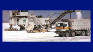 lithium mining - brine - machines conveyors into truck